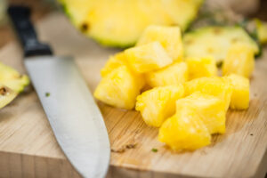 Portion of Pineapple sliced for pizza topping | Toarminas Pizza Pinapple cut for topping on pizza